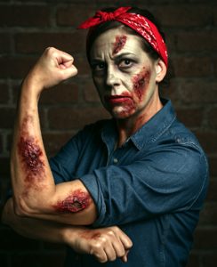 DIY Rosie the Riveter Zombie Costume with denim shirt, red bandana, and zombie makeup