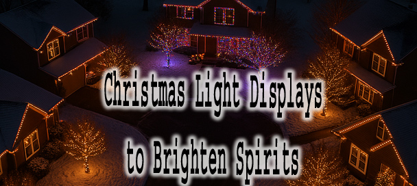 Drone photo of Christmas Light Displays at snowy suburban cul-de-sac at night with five houses decorated in colorful Christmas lights on roofs and trees.