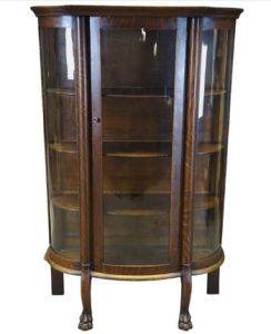 Vintage curio cabinet with mystical collectibles – collecting fortune teller items