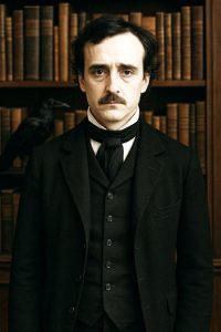 DIY Edgar Allan Poe Costume with gothic bookcase and raven background