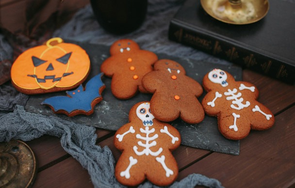 Halloween-themed homemade cookies on a party table
