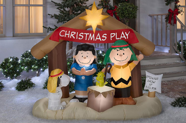 Inflatables Peanuts Nativity Scene glowing at night