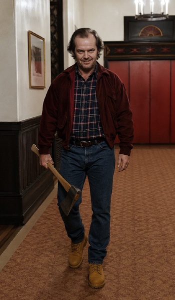  DIY Jack Torrance Costume with red bomber jacket, plaid shirt, blue jeans, wheat nubuck boots, and foam axe prop