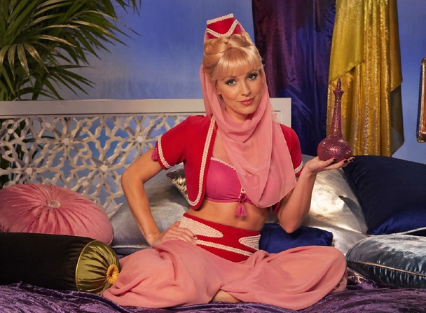 DIY Jeannie Costume with pink cosplay set, mini fez hat, chiffon scarf, and braided bun with bangs
