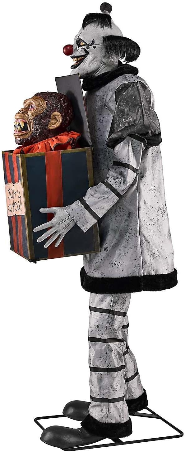 Monkey Business Clown Animatronic side view showing gift box with monkey detail and glowing eyes