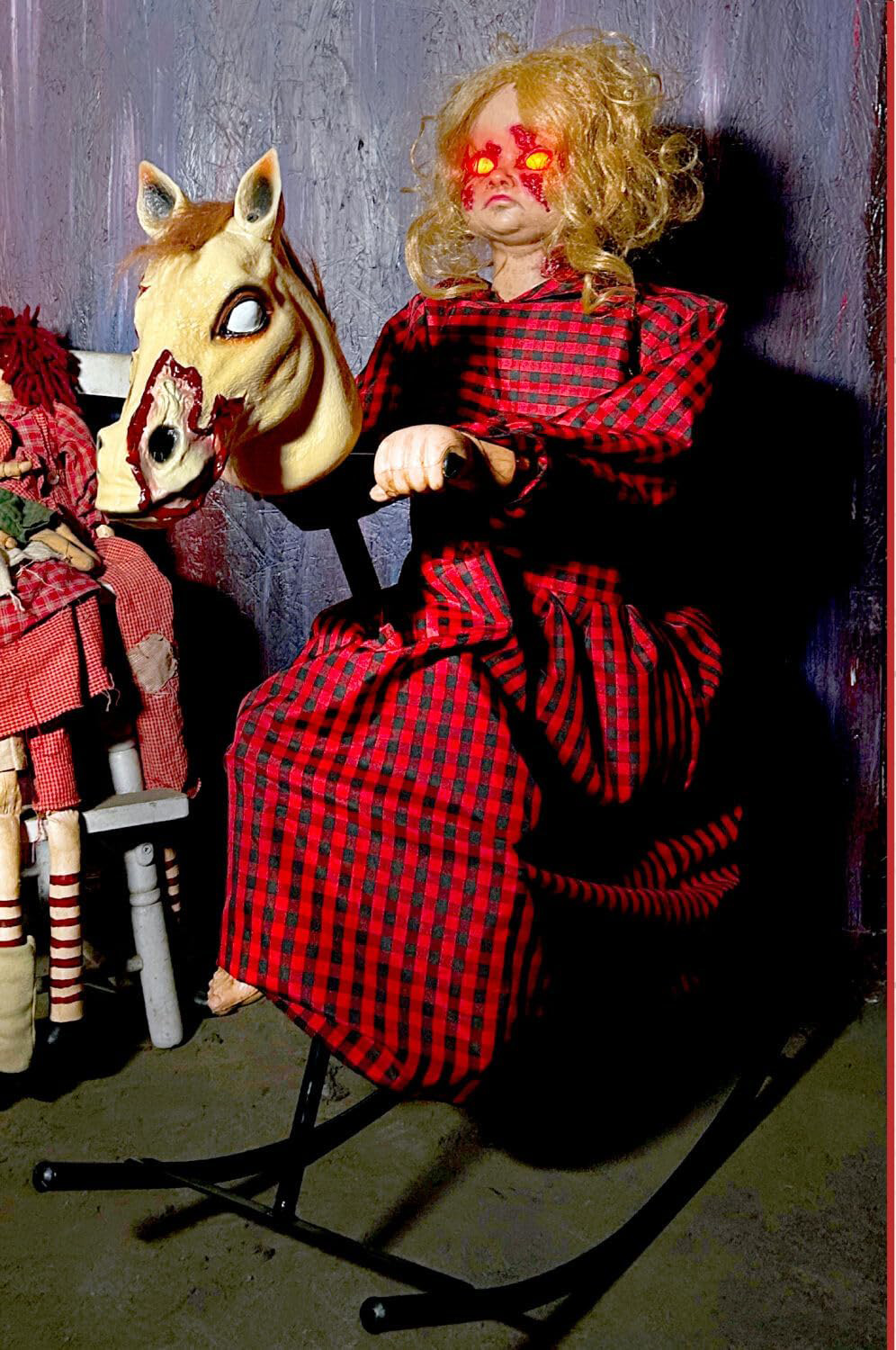 Rocking Horse Girl Animatronic side view showing rocking horse detail and glowing eyes