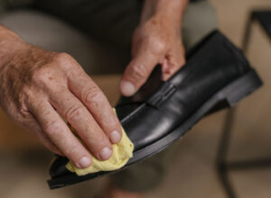 Vintage shoe shine cloth and shoe care items provided to guests in a mid-century motel