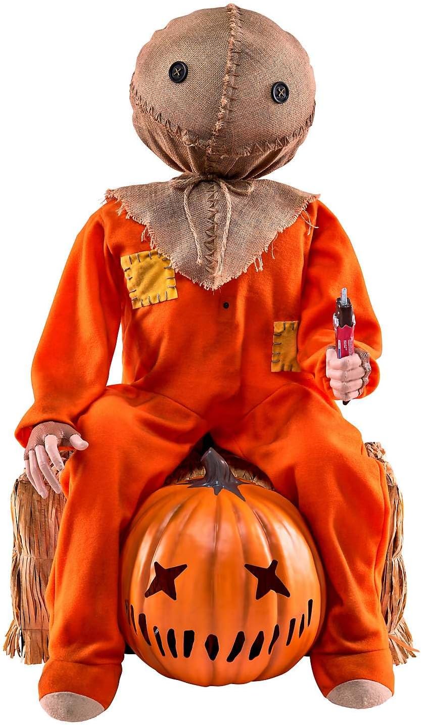 Trick 'r Treat Sam Animatronic displayed in darkened indoor Halloween setting with LED projection visible