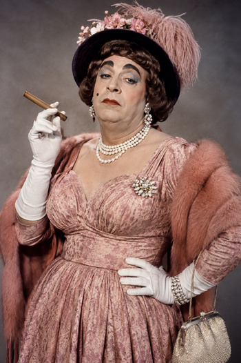 DIY Milton Berle Drag Costume with padded silhouette, pearls, and pancake makeup