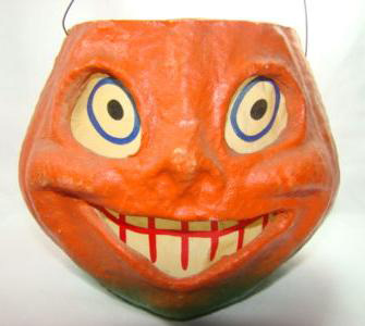 Vintage Halloween Collectibles featuring classic jack-o'-lantern candy containers made from papier-mâché, composition, and early plastic.