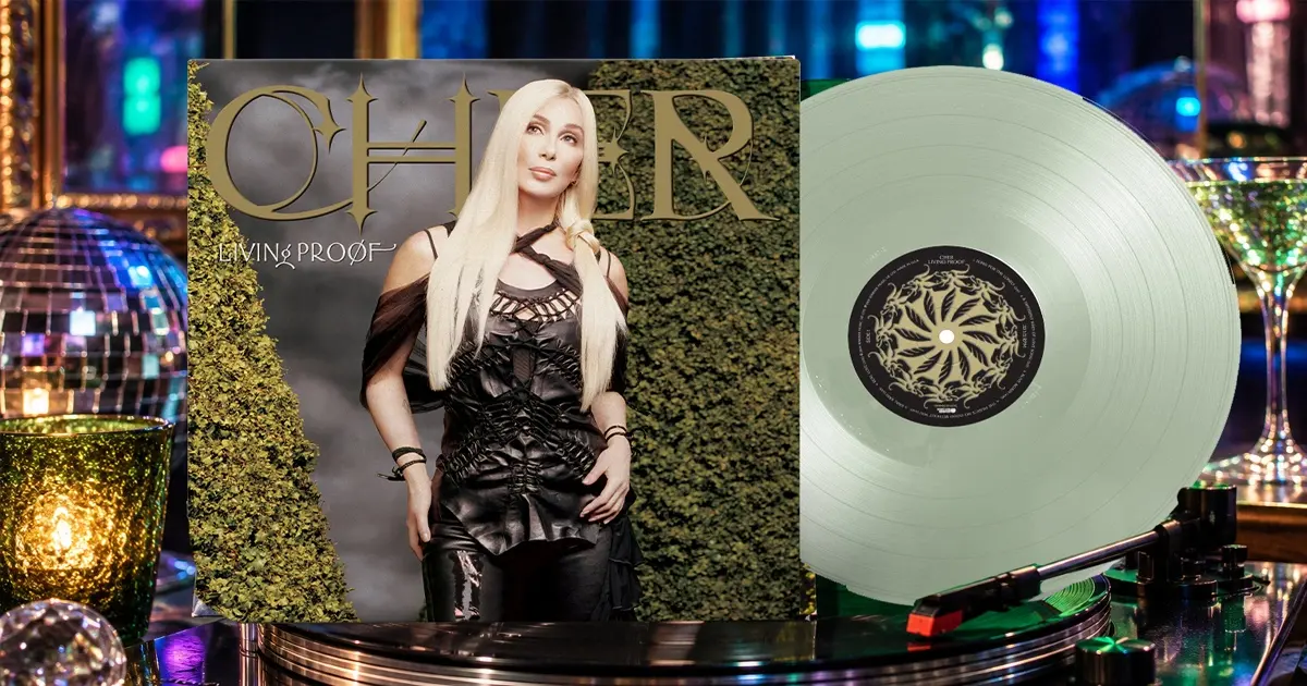 Cher Living Proof Review vinyl album with cola-bottle green record displayed beside a turntable.