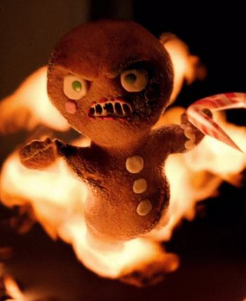 Krampus (2015) Movie Review featuring a sinister gingerbread man, one of the terrifying Christmas creatures brought to life in the holiday horror film.