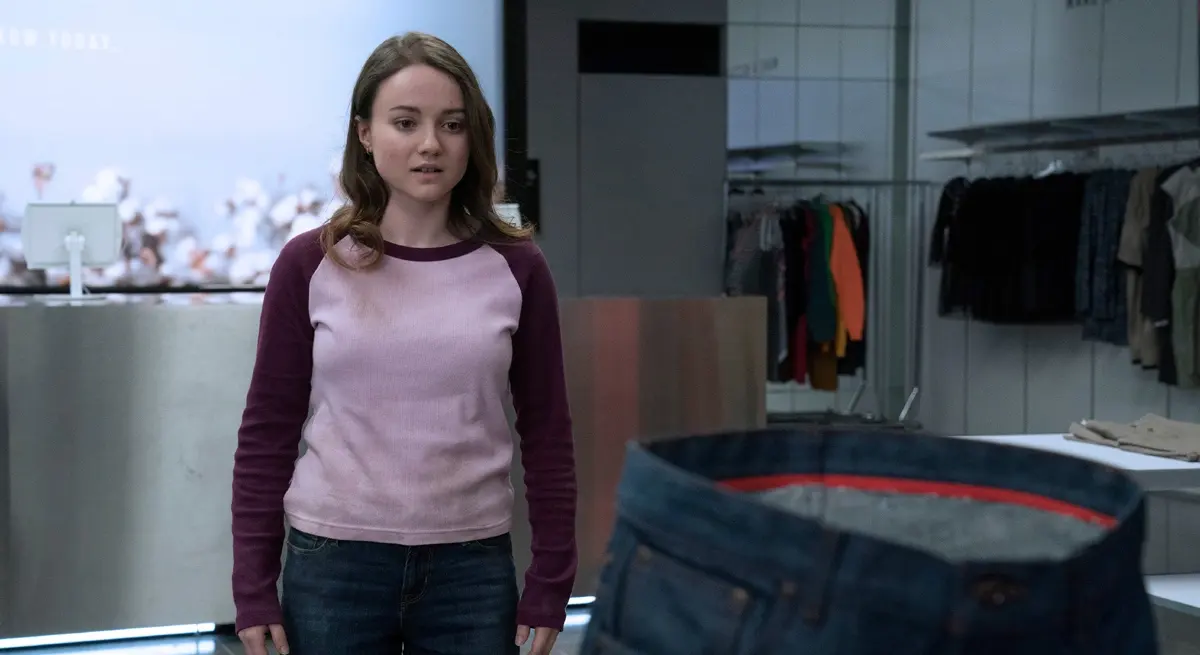 Romane Denis as Libby McClean in Slaxx (2020), a Canadian horror comedy about possessed killer jeans.