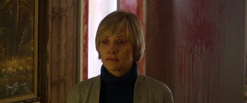 Barbara Crampton plays Anne